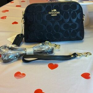 New  black  crossbody bag with long and short straps .